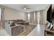 The cozy living room is the perfect space to relax and entertain in this home at 1634 Deep Valley Ave, North Las Vegas, NV 89084