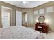 Bedroom with carpeted floors, vanity, natural light, and neutral paint at 1637 Wellington Springs Ave, Henderson, NV 89052