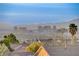 Panoramic city view from rooftop showcasing the skyline and surrounding mountains in the distance at 1637 Wellington Springs Ave, Henderson, NV 89052
