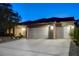 Well-maintained home with a spacious three-car garage and manicured landscaping at 1637 Wellington Springs Ave, Henderson, NV 89052