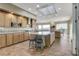 Spacious kitchen with large island, breakfast bar, granite countertops, and stainless steel appliances at 1637 Wellington Springs Ave, Henderson, NV 89052