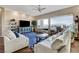 Comfortable living room with large windows offering panoramic views and stylish furnishings at 1637 Wellington Springs Ave, Henderson, NV 89052