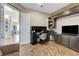 Spacious home office featuring custom built-ins, dual workstations, and natural light for a productive atmosphere at 1637 Wellington Springs Ave, Henderson, NV 89052