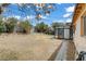 Backyard with a sunroom and brick pavers at 1674 Palma Vista Ave, Las Vegas, NV 89169