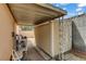Backyard storage area featuring a shed with shelves for organization and additional storage at 1674 Palma Vista Ave, Las Vegas, NV 89169