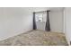 Bedroom with neutral-toned walls, carpet, and natural light from a window at 1674 Palma Vista Ave, Las Vegas, NV 89169