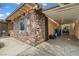 Open carport area featuring unique stone elements on the exterior at 1674 Palma Vista Ave, Las Vegas, NV 89169