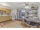 Eat-in kitchen featuring a mix of retro cabinets, linoleum floors and dining area at 1674 Palma Vista Ave, Las Vegas, NV 89169