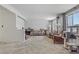 Spacious living room featuring a large window offering ample natural light, open layout at 1674 Palma Vista Ave, Las Vegas, NV 89169