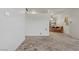 Spacious living area with bare floors and neutral walls at 1674 Palma Vista Ave, Las Vegas, NV 89169