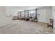 Open living room with lots of floor space, featuring natural light and neutral paint at 1674 Palma Vista Ave, Las Vegas, NV 89169