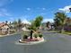Gated community entrance with desert landscaping, offering security and curb appeal at 1753 Tanner Cir, Henderson, NV 89012