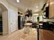 Efficient kitchen with stainless steel appliances and a cozy breakfast nook area at 1753 Tanner Cir, Henderson, NV 89012