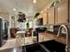 Well-lit kitchen with efficient appliances and countertop space for meal preparation and casual dining at 1753 Tanner Cir, Henderson, NV 89012