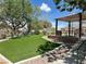 Community park with artificial turf, picnic area, and ample space for recreation at 1753 Tanner Cir, Henderson, NV 89012