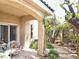 Charming backyard patio with ample seating and lush greenery, perfect for outdoor relaxation at 1753 Tanner Cir, Henderson, NV 89012