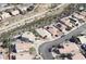 An aerial view shows the property's location in a well-maintained community with mature landscaping and nearby waterway at 1768 Saint Thomas Dr, Henderson, NV 89074