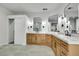 Bright bathroom with light-colored vanities, marble countertops, and modern finishes at 193 Jeri Dr, Henderson, NV 89074