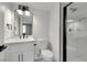 Bathroom featuring a single sink vanity, a modern mirror, and a walk-in shower at 193 Jeri Dr, Henderson, NV 89074