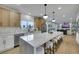Modern kitchen with stainless steel appliances, marble countertops, and a large island with seating at 193 Jeri Dr, Henderson, NV 89074