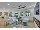 A comfortable living room featuring a modern ceiling fan and open-concept design at 193 Jeri Dr, Henderson, NV 89074