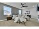 Serene main bedroom with soft lighting, a comfortable bed, and elegant seating area at 193 Jeri Dr, Henderson, NV 89074