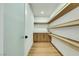 Well-organized walk-in pantry with custom shelving and storage cabinets at 193 Jeri Dr, Henderson, NV 89074