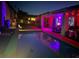 Lush backyard features a sparkling pool reflecting the home's stylish lighting and entertainment space at 2092 Wildwood Lake Street, Henderson, NV 89052