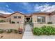 Inviting gated courtyard with desert landscaping and small seating area at 2092 Wildwood Lake Street, Henderson, NV 89052