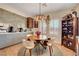 Cozy dining area features a round table, stylish chairs, and built-in bar perfect for casual meals at 2092 Wildwood Lake Street, Henderson, NV 89052