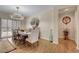 Bright dining room with tile floors and chandelier at 2092 Wildwood Lake Street, Henderson, NV 89052
