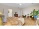 Spacious main bedroom with wood floors, comfortable seating, and ensuite bathroom access at 2092 Wildwood Lake Street, Henderson, NV 89052
