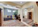 Comfortable office with ample natural light, a sofa, and an area for storage and display at 2092 Wildwood Lake Street, Henderson, NV 89052