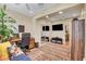 A bright office featuring recessed lighting, a television, and a mirrored closet at 2092 Wildwood Lake Street, Henderson, NV 89052