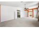 Spacious living room with neutral carpet, and doorways leading to other rooms at 2097 Eaglepath Cir, Henderson, NV 89074
