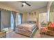 Cozy bedroom with plush carpeting and French doors to the exterior at 2129 N Michael Way, Las Vegas, NV 89108
