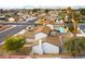Aerial view of the property with a pool in the backyard and mature trees surrounding the home at 2346 Roan Ave, Las Vegas, NV 89119