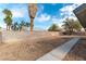 Large backyard with cinder block fence offering lots of potential for entertaining and relaxation at 2346 Roan Ave, Las Vegas, NV 89119