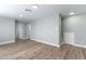 Spacious basement featuring wood-look flooring, neutral walls, and ample space at 2346 Roan Ave, Las Vegas, NV 89119
