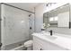 Updated bathroom features modern finishes, a new vanity, and walk-in shower at 2346 Roan Ave, Las Vegas, NV 89119