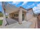 Backyard featuring a covered patio, manicured landscaping, and a privacy fence at 2349 Orangeburg Pl, Henderson, NV 89044