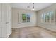 Bedroom with tile flooring, natural light from two windows and a spacious closet at 2349 Orangeburg Pl, Henderson, NV 89044