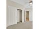 Neutral bedroom with carpet, a ceiling fan, and a walk in closet at 2349 Orangeburg Pl, Henderson, NV 89044