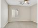 Neutral bedroom with carpet, a ceiling fan, and a window with shutters at 2349 Orangeburg Pl, Henderson, NV 89044
