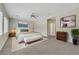 Spacious bedroom featuring a ceiling fan, neutral tones and comfortable decor at 2349 Orangeburg Pl, Henderson, NV 89044