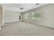 Bonus room with carpet, a door to the outside, and windows with shutters at 2349 Orangeburg Pl, Henderson, NV 89044