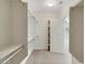 A walk-in closet with white shelving and carpet at 2349 Orangeburg Pl, Henderson, NV 89044