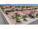 Beautiful single-story home featuring desert landscaping, a red tile roof, and well-maintained grounds at 2349 Orangeburg Pl, Henderson, NV 89044