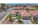 Inviting single-story home with a red tile roof, desert landscaping, and charming curb appeal at 2349 Orangeburg Pl, Henderson, NV 89044