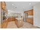 Open kitchen with stainless appliances and granite counters, perfect for entertaining at 2349 Orangeburg Pl, Henderson, NV 89044